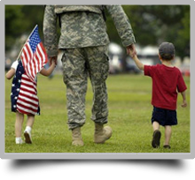 A picture of a Soldier walking hand in hand with a little boy and a little girl; clicking the image will display a list of hyperlinks for family services available on Fort Eustis.