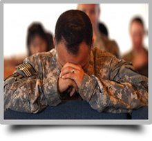 A picture of a Soldier with his head down in prayer; clicking the image will display a list of hyperlinks for spiritual and emotional services available on Fort Eustis.